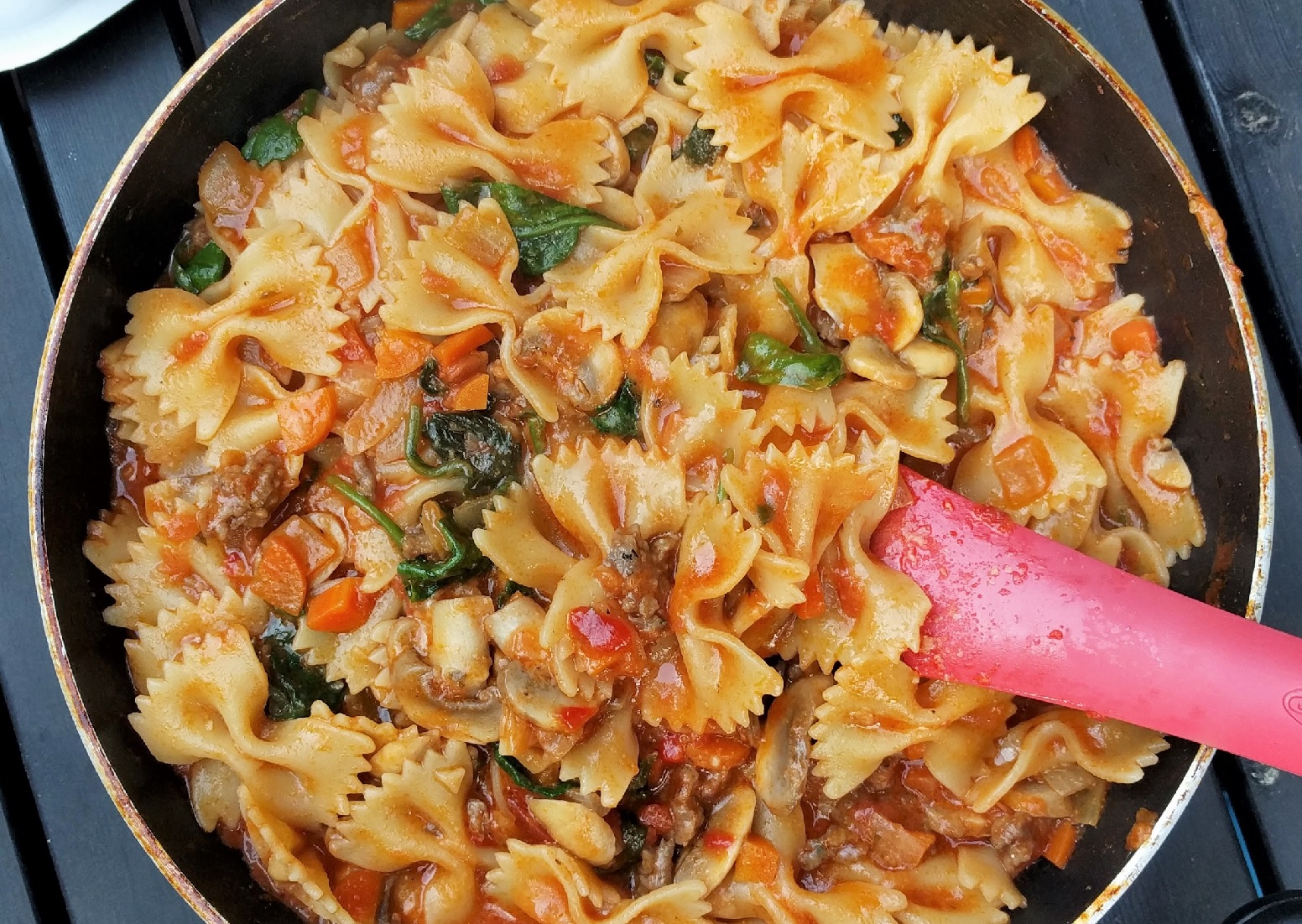mouth watering bowtie pasta with lots of vegetables